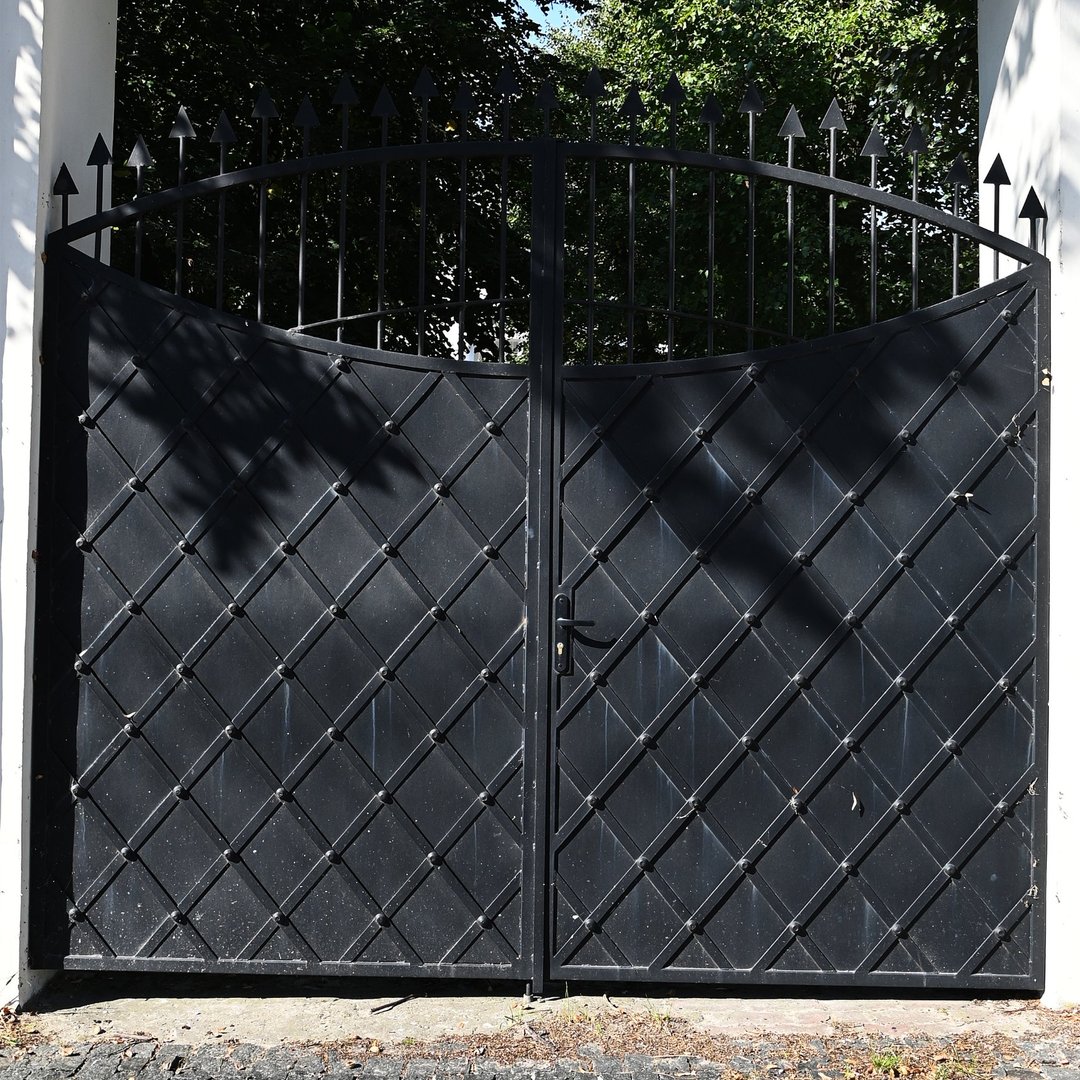 black-forged-gates-closing-entrance-private-property-1080x1080
