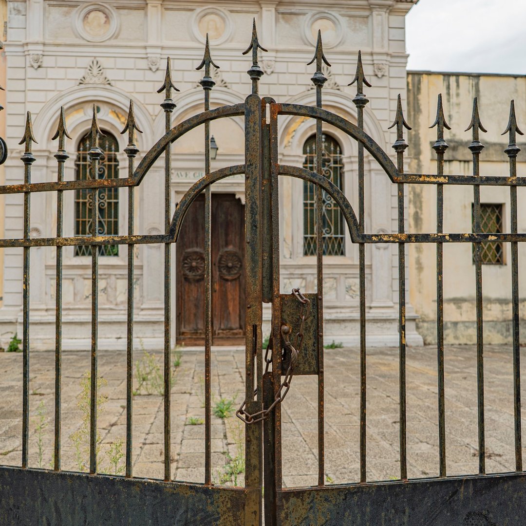 wrought-iron-gate-spikes-detail-ancient-building-italy-1080x1080